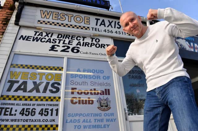 Westoe Taxi's director Gary Davies and former player supporting South Shields FC