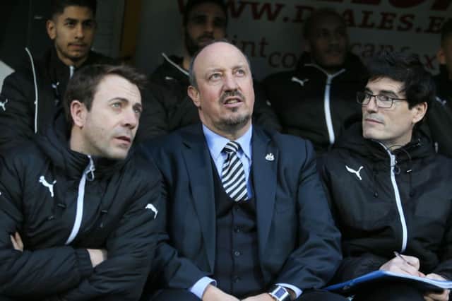 Newcastle United manager Rafael Benitez and assistants during the Sky                                                           Bet Championship match at the John Smiths Stadium, Huddersfield