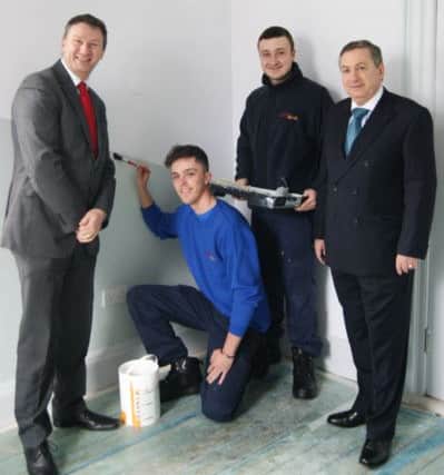 South Tyneside Homes apprentices David Goodfellow, centre left, and Thomas Goodman, centre right, with Andrew Watts, chief executive of Groundwork STAN, left, and Coun Ed Malcolm, at Jarrow Hall House.
