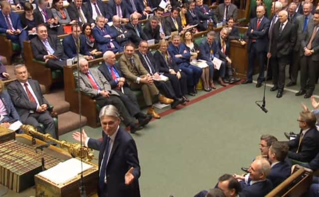 Chancellor of the Exchequer Philip Hammond gestures while making his Budget statement to MPs in the House of Commons. PRESS ASSOCIATION Photo. Picture date: Wednesday March 8, 2017. See PA story BUDGET Main. Photo credit should read: PA Wire