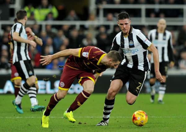 Newcastle United defender Ciaran Clark in action against QPR at St Jamess Park.