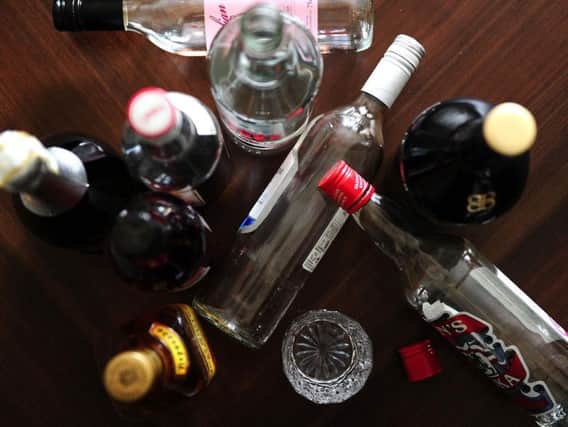 Empty bottles of alcohol. A third of Britons have cut or limited their alcohol intake over the last year, a survey has found. Picture by Ian West/PA Wire