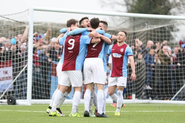 South Shields' players celebrate their winning goal in the first leg. Image by Peter Talbot.