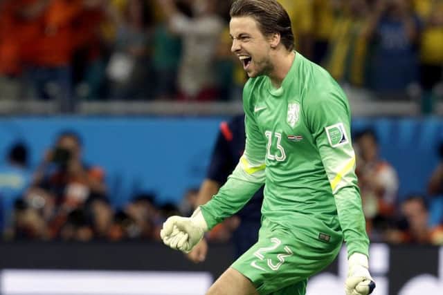 Krul celebrates a penalty save in the World Cup for Holland