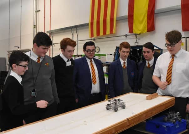Students testing a vehicle at the Skills Academy for Sustainable Manufacturing and Innovation.
