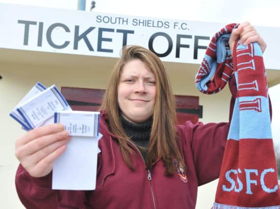 South Shields Football Club's Alisha Henry with empty ticket books for the club's FA Vase semi final.