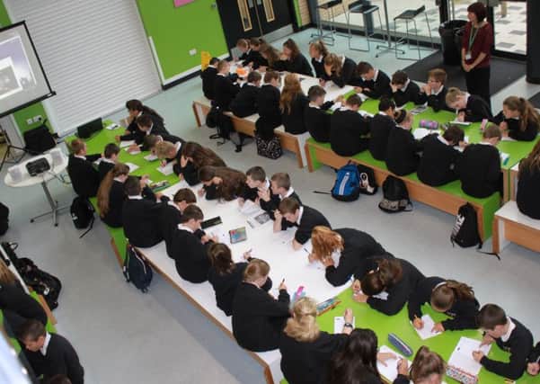 South Shields School pupils do maths to music.