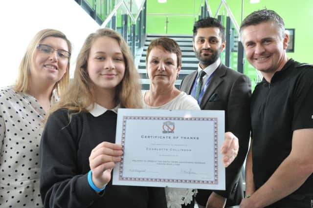 South Shields Community School pupil Charlotte Collinson receives her award from, left to right, Gemma Maughan, Pat McDougall, associate headteacher Hojab Zaheer, and Sgt Steve Prested.
