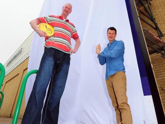 A funeral service for Neil Fingleton (left) will be held today