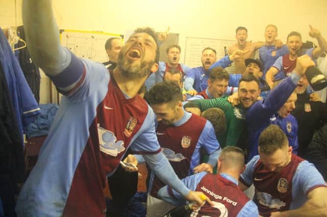 Julio Arca celebrates in the changing rooms after Shields' win