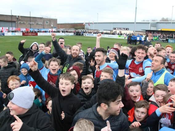 South Shields fans celebrate getting to Wembley. Pic: Peter Talbot.