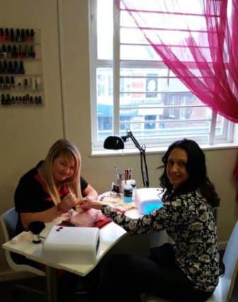 Lorraine Carson having her nails done at Geezers and Gals.