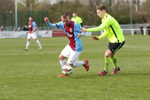 Barrie Smith tries to find a way through against Bishop Auckland. Image by Peter Talbot.