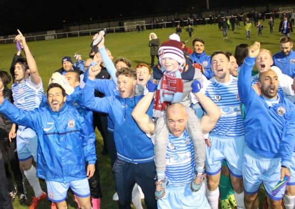 Shields players celebrate winning the league title. Picture by Peter Talbot.