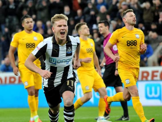Matt Ritchie slots home United's third from the spot