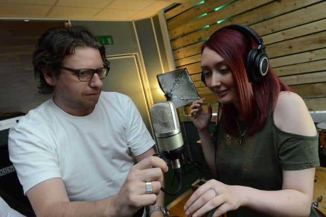 AutismAble member Melissa Binyon recording with Ross Lewis.