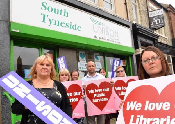 UNISON are staging a protest against library changes. 
Front from left secretary Jan Green and regional officer Gemma Taylor