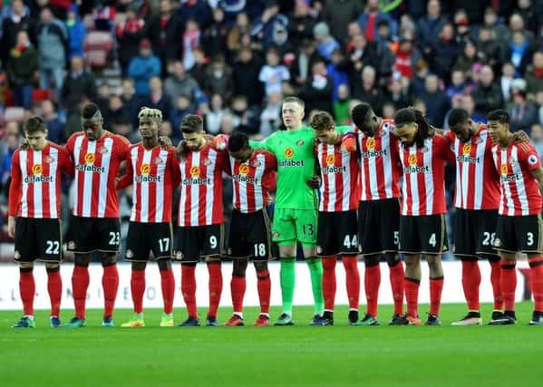 Sunderland players bow their heads in a minutes silence, but how many of them can really hold their heads up high after a disastrous season in the Premier League?