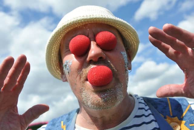 Circus performer Martin Bloomfield entertains the crowd at Bilton Hall.