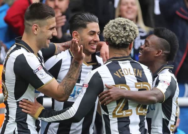 Newcastle Uniteds Ayoze Perez (second left) celebrates scoring at St Jamess Park.