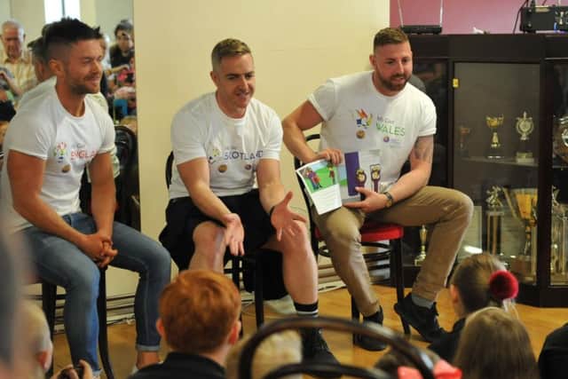 Mr Gay Scotland, England and Wales read a story to youngters at Hatton Dance Academy.