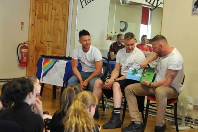 Mr Gay Scotland, England and Wales read a story to youngters at Hatton Dance Academy.