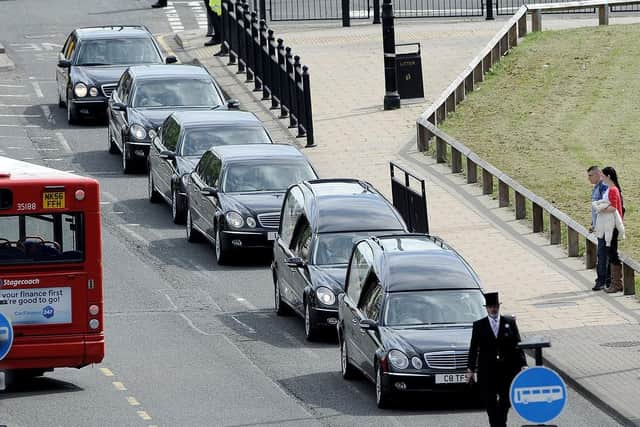 The funeral cortege arrives at St Hilda's Church, South Shields.