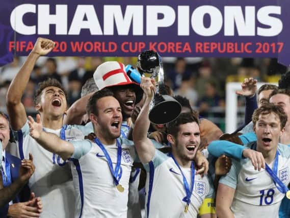 Adam Armstrong with his England teammates and the Under-20 World Cup trophy