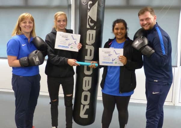 Centre left, Alex Fontaine, the new Female Football Development Apprentice at South Tyneside College, and Shakila Ahmed, a volunteer sports coach at the college, with, far left, Ruth Nicholson, Coaching Development Manager at Tyne & Wear Sport, and Chris Reay, Sport Maker at South Tyneside College