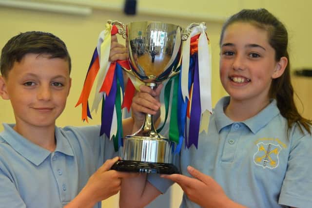 House captain Darci Shaw, 10 and vice captain Michael Hassan, 11