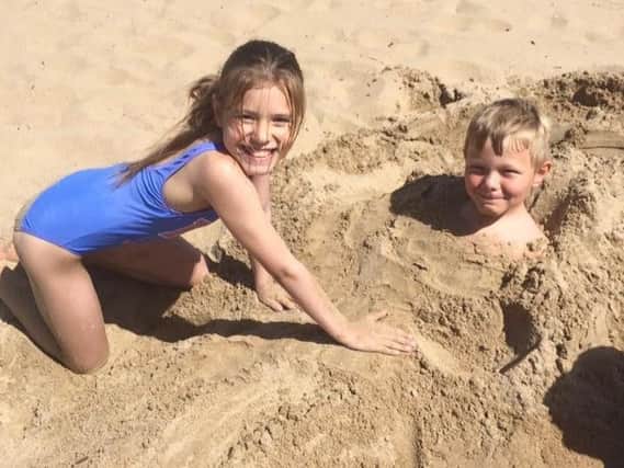 Nikki Cunningham sent us this picture of her daughter Lydia, 11, and son Jacob, 7, on the beach at South Shields.