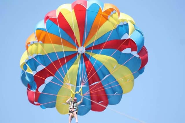 Anthony parasailed as part of his month of action.