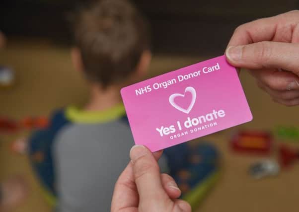 "Yes I donate" NHS organ donor card.