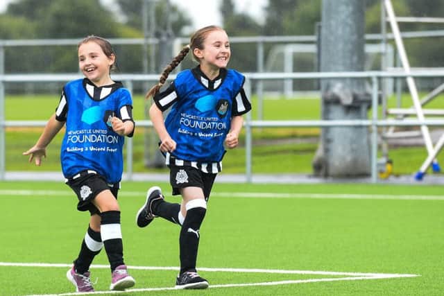 Girls celebrate after scoring a goal during the Foundation 1892 Cup at the Newcastle United Academy. Photo by Serena Taylor/Newcastle United