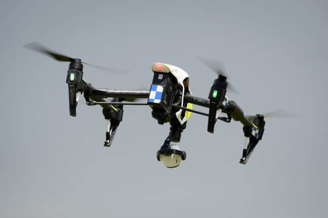 A DJI Inspire 1s drone in flight, as Devon & Cornwall and Dorset Police launch the first fully operational drone unit used by police at Westpoint Arena in Clyst St Mary, near Exeter, in co-operation with Dorset Police. Picture by Ben Birchall/PA Wire