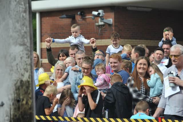 Crowds watch a chip pan fire demonstration at South Shields Community Fire Station open day.