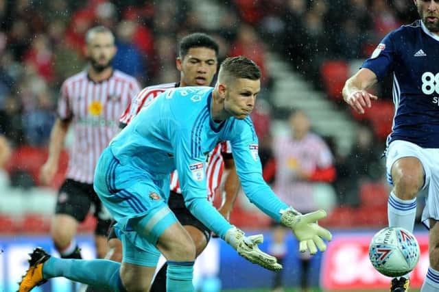 Sunderland keeper Robbin Ruiter gathers the ball under pressure from Forest's Daryl Murphy. Picture by Frank Reid