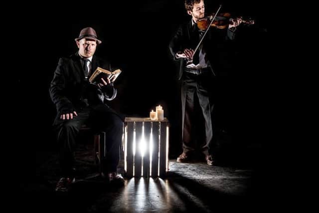 Adam Z Robinson and Ben Styles as The Storyteller and The Musician in the Book of Darkness and Light.