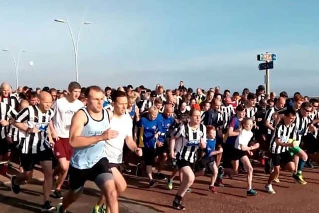 Runners cross the starting line of the South Shields parkrun today.