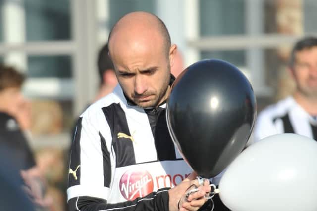 South Shields Park Run competitors pay tribute to fellow runner Mark Wood, by sporting Newcastle United football shirts, and releasing black and white balloons.