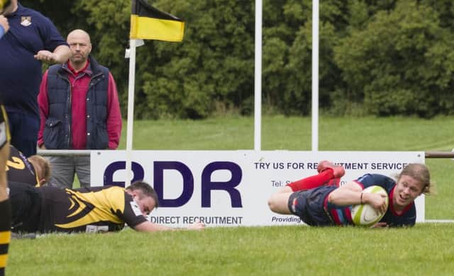 Paul Evans goes over for a try. Pic: Phil Haswell