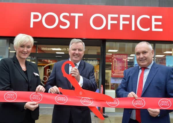 At the official opening of the new South Shields Post Office, from left, are branch manager Tracey Sloan, South Tyneside Council leader Coun Iain Malcolm and area manager John Jones.