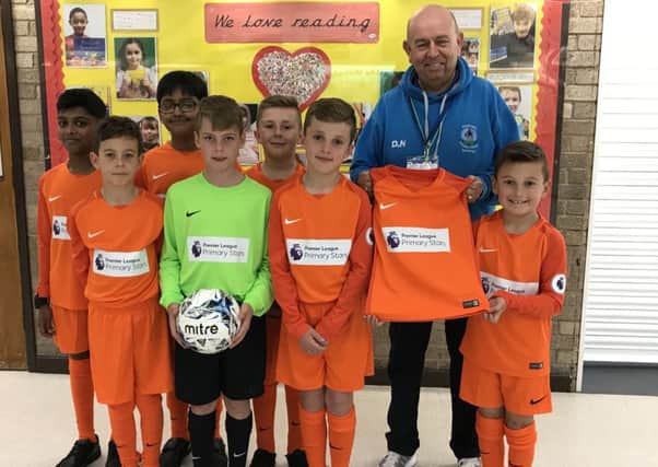 Hadrian Primary football team sporting their new look