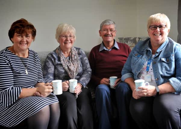 John Wright and partner Margaret Johnson, with Coun Tracey Dixon and Alzheimer Society's Liz Williams.