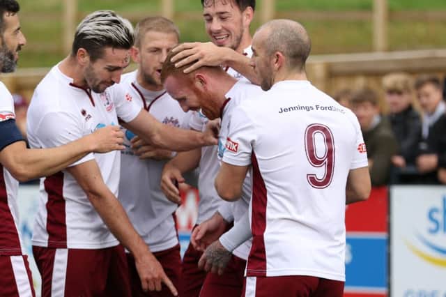 South Shields' players celebrate Matty Pattison's goal at Scarborough. Picture by Peter Talbot.