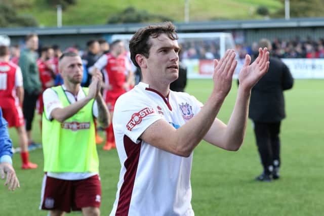 South Shields' Luke Sullivan and Barrie Smith applaud the fans after the win at Scarborough. Picture by Peter Talbot.