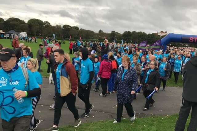 People line up ahead of the Alzheimer's Society Memory Walk in South Shields.