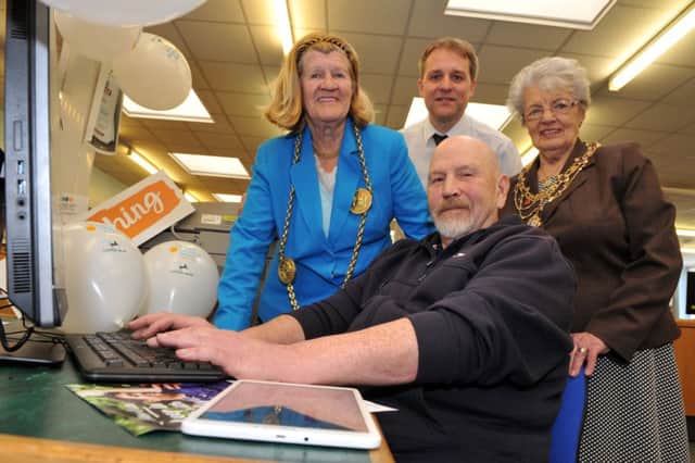 Librarian Tom Relph with the Mayor Coun Olive Punchion and Mayoress Mrs Mary French at Jarrow Library, with adult learner Michael Payne. Picture by Tim Richardson