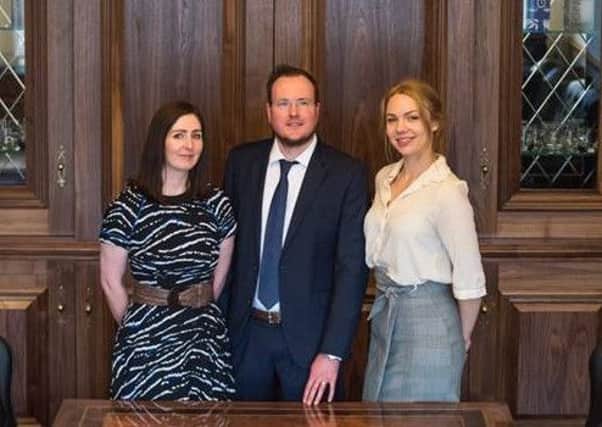 Graeme Jordan with researcher Rachel Gordon and marketing executive Morta Jablonskaite.