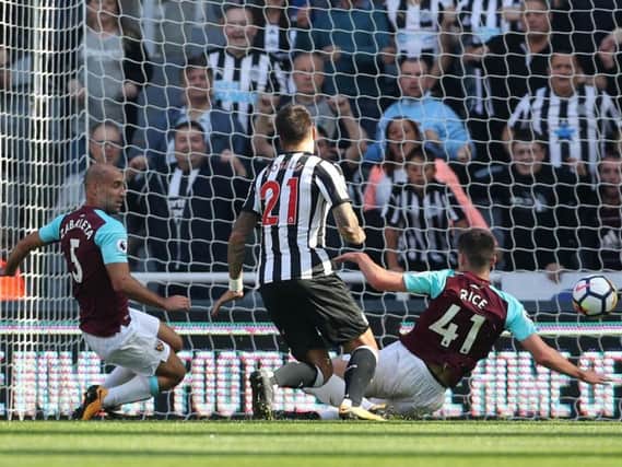 Joselu (number 21) opens the scoring for Newcastle against West Ham earlier this season.